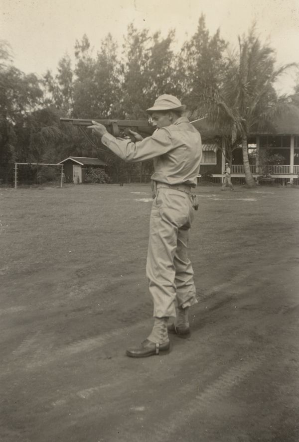 John P. Earley training on machine gun
